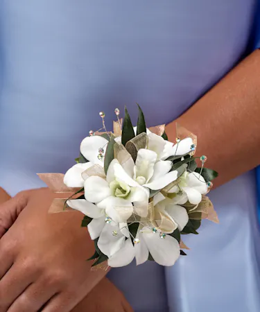 white dendrobium orchid wrist corsage with rhinestones.