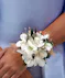 white dendrobium orchid wrist corsage with rhinestones.
