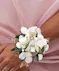 white dendrobium orchid wrist corsage with rhinestones.