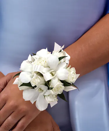 white spray roses and orchids with rhinestones wrist corsage