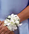 white spray roses and orchids with rhinestones wrist corsage