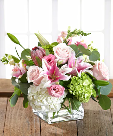Blessings in Pink & White featuring pink roses, stargazer lilies and white hydrangea