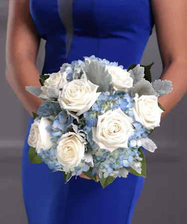 Blue and White Bridesmaid Bouquet of blue hydrangea, white roses and dusty miller