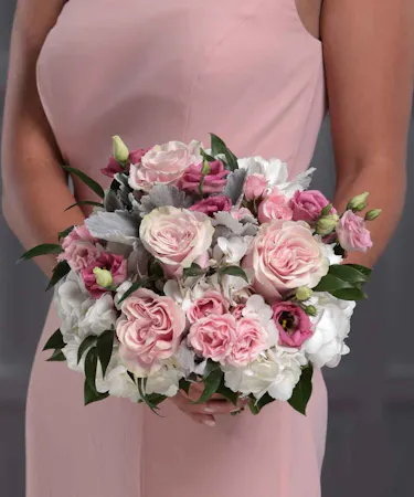 Bridesmaid Pink Pave Bouquet featuring pink roses, pink spray roses, white hydrangea and lisianthus