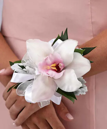 White cymbidium orchid wrist corsage