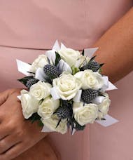 White Sweetheart Roses and Blue Thistle Wrist Corsage