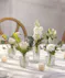Carithers Party Tabletop Budvases featuring assorted premium florals and foliage.  Available in your choice of colors to match your event.