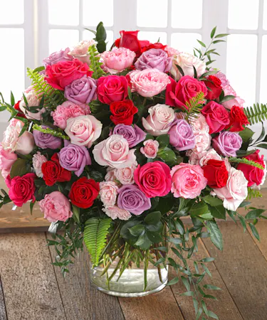 The Heart and Soul Rose Bouquet features 100 romantic blooms of Ecuadorian Mountain Roses, Cottage Roses and Garden Roses
