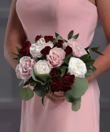 Burgundy Nosegay featuring Roses, Ranunculus, Garden Roses & Foliage