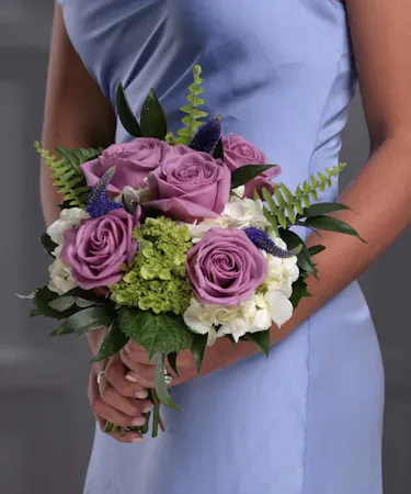 Lavender Pave Nosegay of hydrangea, roses, veronica and seasonal foliage