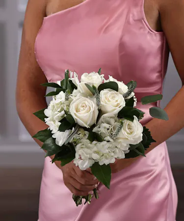 White Pave Hand-tied Nosegay featuring white hydrangea, roses, and veronica