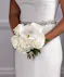 Bridal bouquet of white roses and orchids
