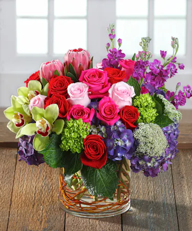 The Rhapsody Bouquet featuring hydrangea, exotic orchids, calla lilies, and Ecuadorian roses, 