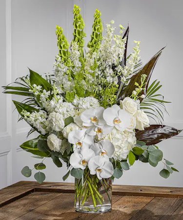 white flowers in tall, elegant arrangement