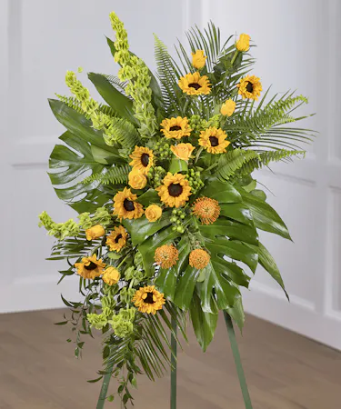 Sunflower Garden Sympathy Spray on a standing easel