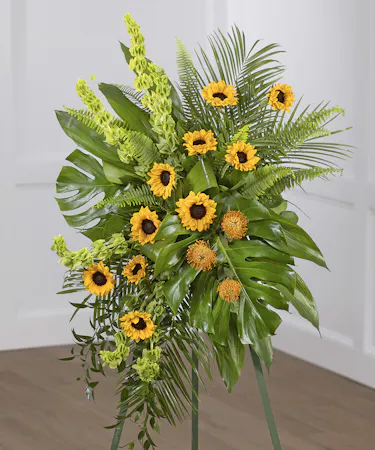 Sunflower Garden Sympathy Spray on a standing easel