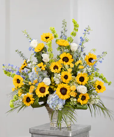 Sunflower Garden Sympathy Basket featuring sunflowers, hydrangea, and eucalyptus