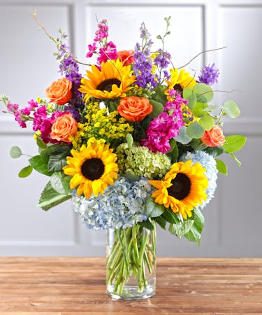 The Vibrant Garden Vista Features Sunflowers Hydrangea Roses And Seasonal Flowers With Same Day Delivery In Atlanta