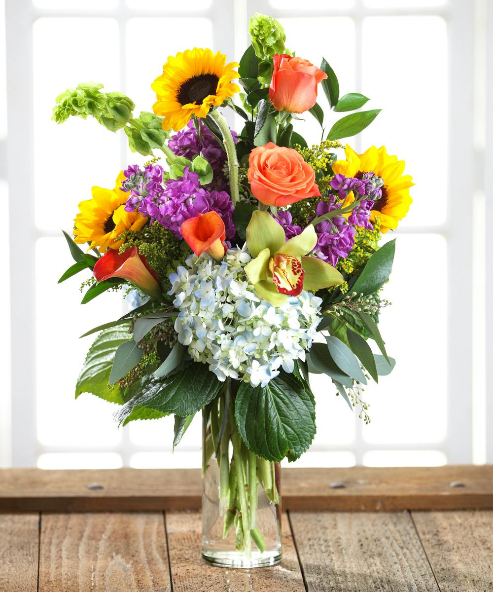 Carithers Bright and Cheerful Bouquet featuring hydrangea, roses, stock