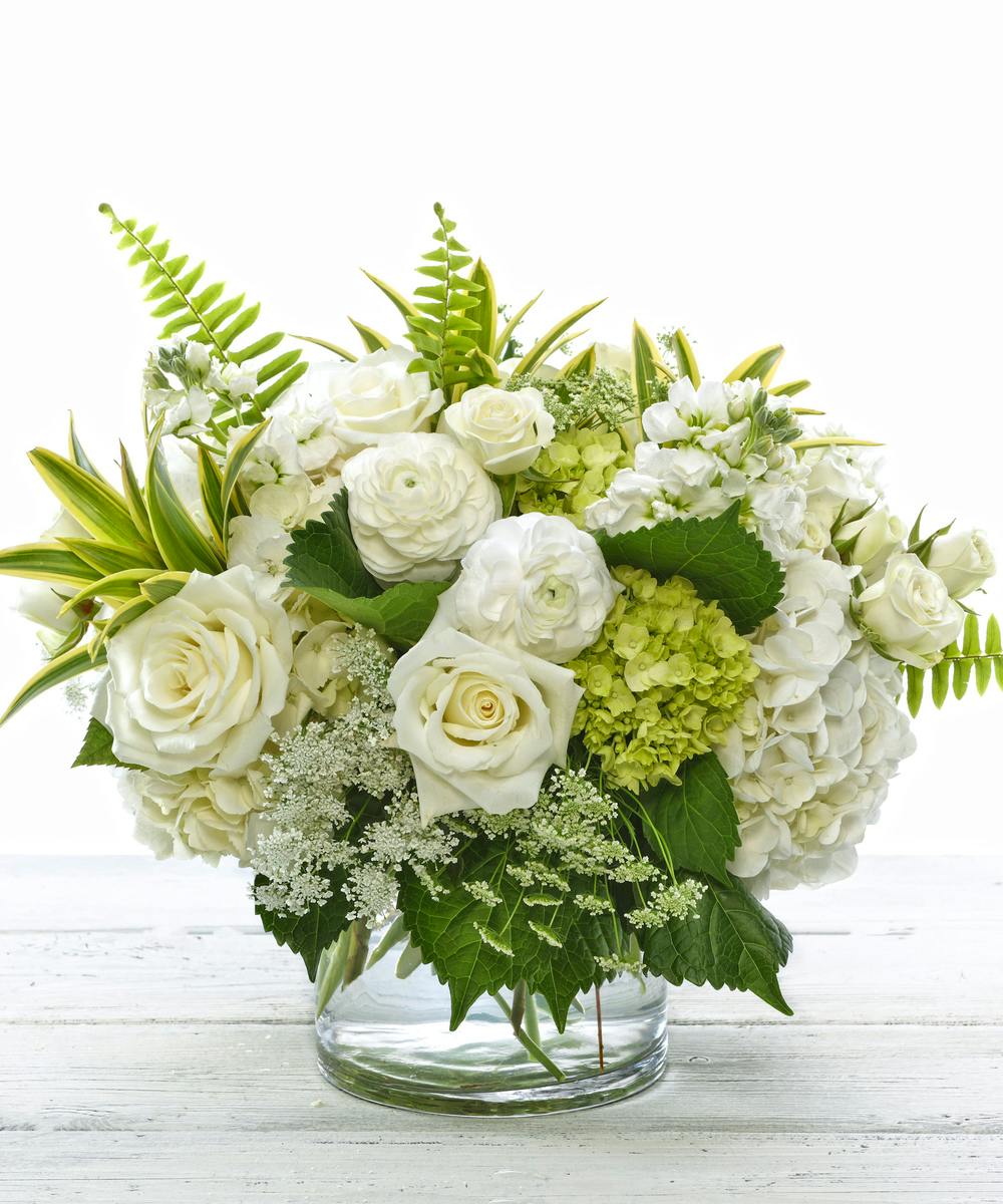 The Symphony Bouquet Features White Hydrangea Roses Ranunculus And Lush Foliage Carithers 1956