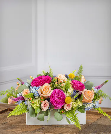 low and long garden-style floral arrangement