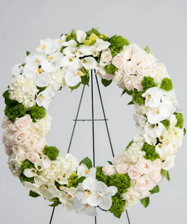 the Cherished Memories Wreath features hydrangea, roses, and orchids with same day delivery in Atlanta